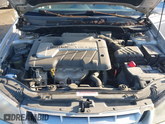 2006 Kia Spectra EX with VIN KNAFE121265312420, listed as a IAAI auction lot 42085732 with 59,641 mi miles. Bid and sale history available at carsss.com. Image 10.