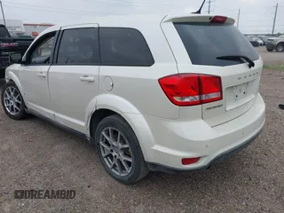 2013 Dodge Journey R/T with VIN 3C4PDCEG5DT642751, listed as a IAAI auction lot 42306951 with 129,338 mi miles and . Bid and sale history available at DreamBid. Image 3.