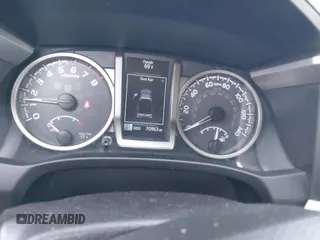 2016 Toyota Tacoma SR with VIN 5TFRX5GN3GX063533, listed as a IAAI auction lot 42592070 with 70,963 mi miles and . Bid and sale history available at DreamBid. Image 7.