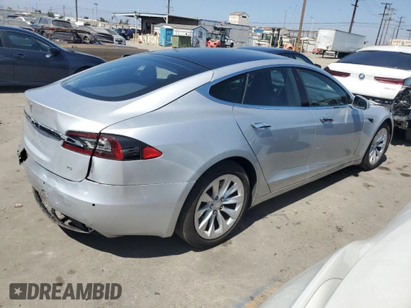 2017 Tesla Model S 60 with VIN 5YJSA1E17HF189627, listed as a Copart auction lot 64454635 with 106,003 mi miles and Salvage title. Bid and sale history available at DreamBid. Image 3.