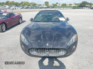 2013 Maserati GranTurismo Convertible Sport with VIN ZAM45MMA2D0069786, listed as a IAAI auction lot 40874830 with 37,312 mi miles. Bid and sale history available at carsss.com. Image 6.