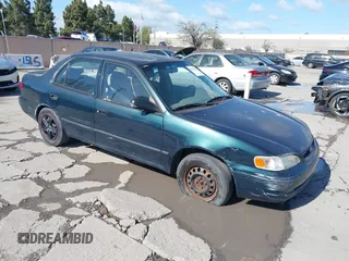 1999 Toyota Corolla VE with VIN 1NXBR12E7XZ244658, listed as a IAAI auction lot 41943437 with 255,799 mi miles and . Bid and sale history available at DreamBid. Image 1.