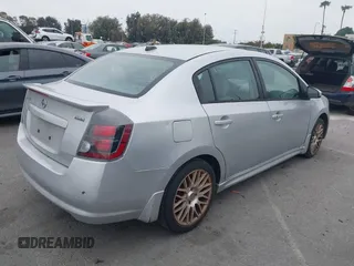 2012 Nissan Sentra 2.0 z VIN 3N1AB6AP8CL695223, wystawiony jako IAAI lot #42464414 z przebiegiem 177 161 mil mil oraz . Historia ofert i sprzedaży dostępna na DreamBid. Obrazek 4.