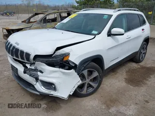 2019 Jeep Cherokee Limited with VIN 1C4PJLDB1KD387310, listed as a IAAI auction lot 42190270 with 96,635 mi miles and . Bid and sale history available at DreamBid. Image 2.