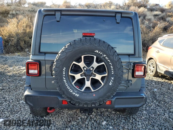 2020 Jeep Wrangler Unlimited Recon with VIN 1C4HJXFN9LW156972, listed as a Copart auction lot 81590604 with 13,834 mi miles and Salvage title. Bid and sale history available at DreamBid. Image 6.