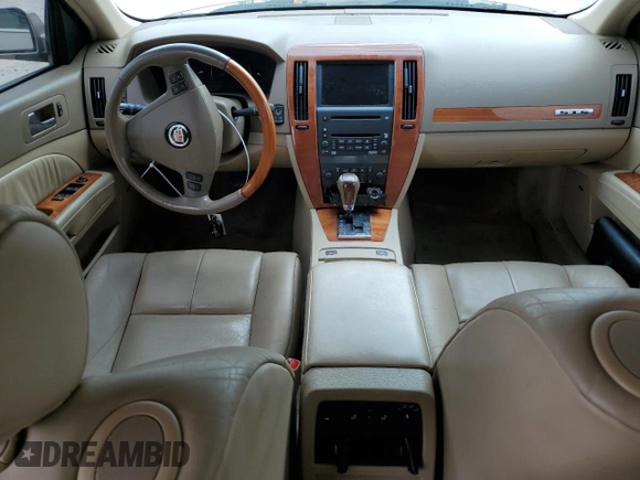 2006 Cadillac STS with VIN 1G6DC67A660194412, listed as a Copart auction lot 69878774 with 140,675 mi miles and Salvage Title. Bid and sale history available at DreamBid. Image 8.