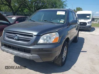 2003 Honda Pilot EX with VIN 2HKYF18463H622625, listed as a IAAI auction lot 41978601 with 152,512 mi miles. Bid and sale history available at carsss.com. Image 2.