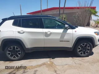 2019 Jeep Compass Trailhawk with VIN 3C4NJDDB4KT780239, listed as a IAAI auction lot 42095643 with 68,995 mi miles and . Bid and sale history available at DreamBid. Image 12.