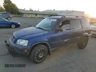 1999 Honda CR-V LX with VIN JHLRD1742XC066975, listed as a Copart auction lot 79447754 with 214,729 mi miles and Salvage Title. Bid and sale history available at carsss.com. Image 1.