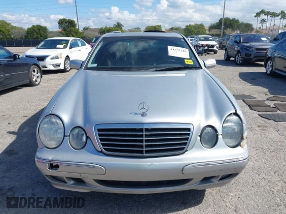 2002 Mercedes-Benz E-Class with VIN WDBJF82J02X070968, listed as a IAAI auction lot 41352216 with 91,704 mi miles. Bid and sale history available at carsss.com. Image 12.