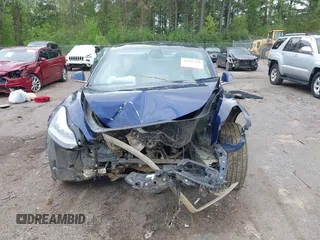 2019 Tesla Model 3 Mid Range z VIN 5YJ3E1EAXKF332974, wystawiony jako IAAI lot #41921722 z przebiegiem Nie podano mil oraz . Historia ofert i sprzedaży dostępna na DreamBid. Obrazek 12.