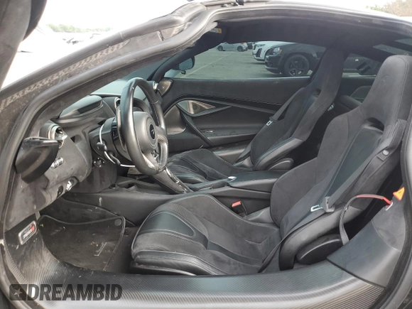 2019 McLaren 720S z VIN SBM14DCAXKW003449, wystawiony jako Copart lot #67229694 z przebiegiem 56 091 mil mil oraz Szkody całkowita. Historia ofert i sprzedaży dostępna na DreamBid. Obrazek 7.