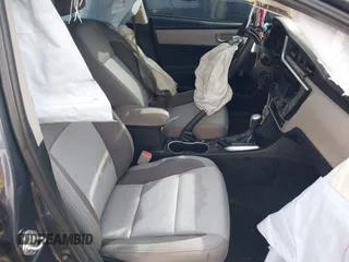 2018 Toyota Corolla L with VIN 5YFBURHE8JP807522, listed as a IAAI auction lot 41609439 with 76,573 mi miles and . Bid and sale history available at DreamBid. Image 5.