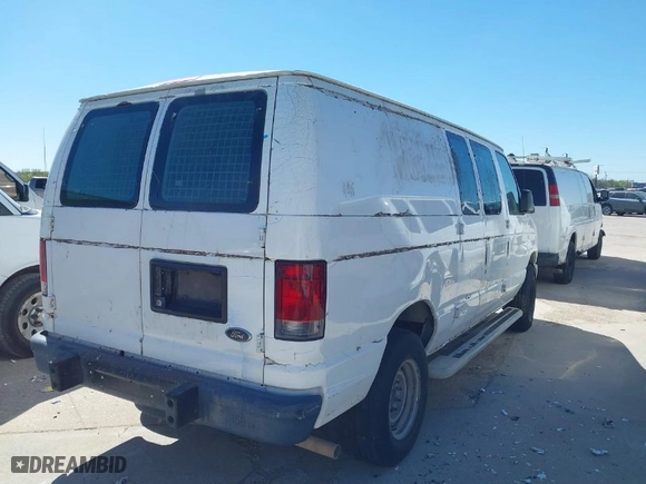 2013 Ford Econoline Cargo Van Commercial with VIN 1FTNE2EW0DDA54574, listed as a IAAI auction lot 41830505 with 127,414 mi miles. Bid and sale history available at carsss.com. Image 4.