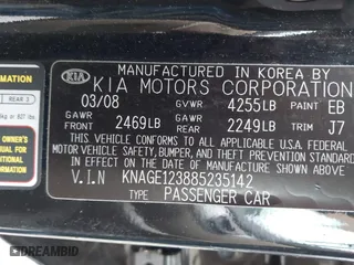 2008 Kia Optima LX with VIN KNAGE123885235142, listed as a IAAI auction lot 42112119 with 145,410 mi miles. Bid and sale history available at carsss.com. Image 9.