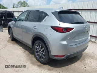 2018 Mazda CX-5 Grand Touring with VIN JM3KFADM6J0339185, listed as a IAAI auction lot 42160763 with 86,312 mi miles and . Bid and sale history available at DreamBid. Image 3.