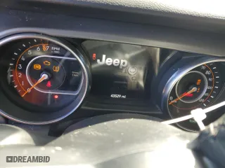 2021 Jeep Gladiator Sport S with VIN 1C6JJTAG5ML606050, listed as a Copart auction lot 45221215 with 43,529 mi miles and Salvage Title. Bid and sale history available at carsss.com. Image 9.