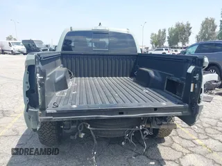 2022 Toyota Tacoma SR5 with VIN 3TMBZ5DN1NM035572, listed as a IAAI auction lot 42083925 with 82,596 mi miles and . Bid and sale history available at DreamBid. Image 6.