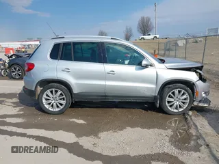 2011 Volkswagen Tiguan SE with VIN WVGBV7AX2BW562055, listed as a IAAI auction lot 41642084 with 175,407 mi miles and . Bid and sale history available at DreamBid. Image 13.