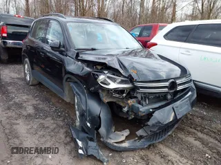 2015 Volkswagen Tiguan SE z VIN WVGBV7AXXFW612903, wystawiony jako IAAI lot #41017461 z przebiegiem 149 297 mil mil oraz . Historia ofert i sprzedaży dostępna na DreamBid. Obrazek 1.