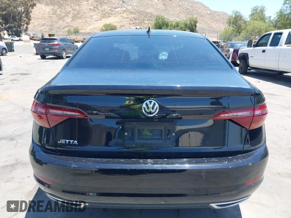 2019 Volkswagen Jetta S z VIN 3VWC57BU1KM116991, wystawiony jako IAAI lot #42377777 z przebiegiem 70 910 mil mil oraz . Historia ofert i sprzedaży dostępna na DreamBid. Obrazek 16.