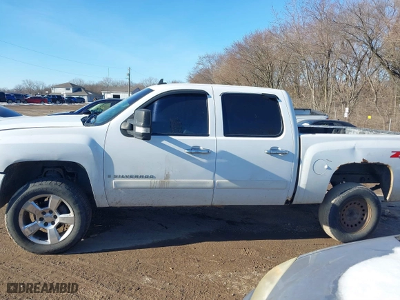 2007 Chevrolet Silverado 1500 LT w/1LT with VIN 2GCEK13M371644904, listed as a IAAI auction lot 41445254 with 294,391 mi miles. Bid and sale history available at carsss.com. Image 14.