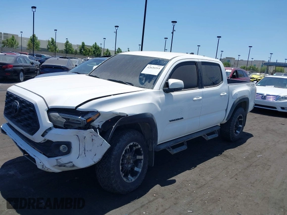 2023 Toyota Tacoma SR with VIN 3TMCZ5AN4PM558760, listed as a IAAI auction lot 42626514 with 39,335 mi miles and . Bid and sale history available at DreamBid. Image 14.