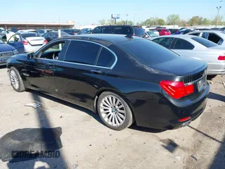 2012 BMW 7 Series 750Li xDrive with VIN WBAKC8C53CC435553, listed as a IAAI auction lot 41852097 with 127,418 mi miles and . Bid and sale history available at DreamBid. Image 3.