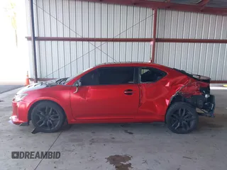 2016 Scion tC z VIN JTKJF5C77GJ023409, wystawiony jako IAAI lot #41538972 z przebiegiem 121 283 mil mil oraz . Historia ofert i sprzedaży dostępna na DreamBid. Obrazek 14.