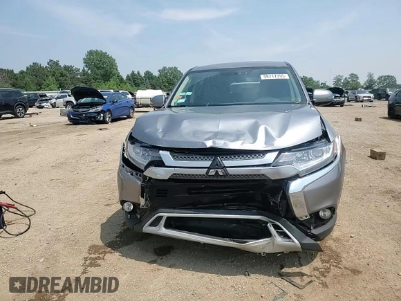 2019 Mitsubishi Outlander SE z VIN JA4AD3A33KZ042531, wystawiony jako Copart lot #59717395 z przebiegiem 125 416 mil mil oraz Szkoda całkowita • Salvage title. Historia ofert i sprzedaży dostępna na DreamBid. Obrazek 13.