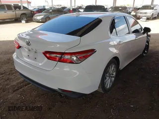 2019 Toyota Camry LE with VIN 4T1B11HK0KU798847, listed as a IAAI auction lot 41944077 with 138,289 mi miles and . Bid and sale history available at DreamBid. Image 4.