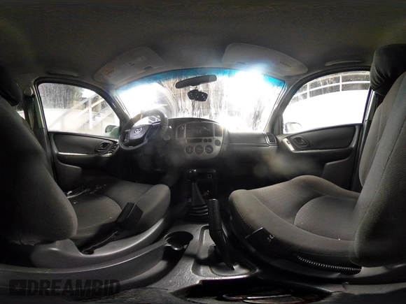 2003 Mazda Tribute DX with VIN 4F2YZ02B73KM43813, listed as a IAAI auction lot 41575708 with 202,214 mi miles and . Bid and sale history available at carsss.com. Image 18.