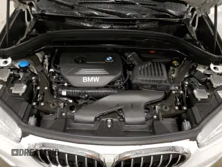2018 BMW X1 xDrive28i with VIN WBXHT3C30J5K29917, listed as a Copart auction lot 56165845 with 131,876 mi miles and Salvage title. Bid and sale history available at DreamBid. Image 12.