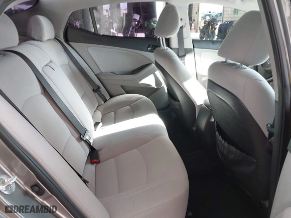 2015 Kia Optima LX with VIN 5XXGM4A77FG415572, listed as a IAAI auction lot 41611627 with 157,836 mi miles. Bid and sale history available at carsss.com. Image 8.