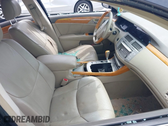 2007 Toyota Avalon XL z VIN 4T1BK36B87U237055, wystawiony jako IAAI lot #42188161 z przebiegiem 139 466 mil mil oraz . Historia ofert i sprzedaży dostępna na DreamBid. Obrazek 5.