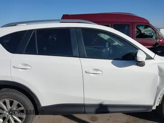 2015 Mazda CX-5 Sport with VIN JM3KE2BE3F0449722, listed as a IAAI auction lot 41825810 with 181,949 mi miles and . Bid and sale history available at DreamBid. Image 14.