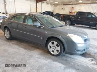 2007 Saturn Aura XE z VIN 1G8ZS57NX7F113634, wystawiony jako IAAI lot #42220503 z przebiegiem 102 611 mil mil oraz . Historia ofert i sprzedaży dostępna na DreamBid. Obrazek 1.