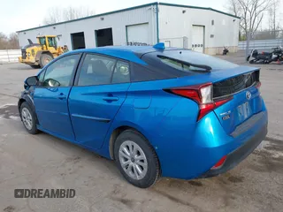 2021 Toyota Prius L Eco with VIN JTDKAMFU5M3145949, listed as a IAAI auction lot 42113123 with 127,872 mi miles and . Bid and sale history available at DreamBid. Image 3.