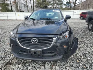 2017 Mazda CX-3 Touring with VIN JM1DKFC70H0141685, listed as a Copart auction lot 49791715 with 127,416 mi miles and Salvage Title. Bid and sale history available at DreamBid. Image 5.