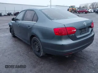 2013 Volkswagen Jetta SE with VIN 3VWDP7AJ8DM405519, listed as a IAAI auction lot 41177485 with 199,574 mi miles and . Bid and sale history available at DreamBid. Image 3.