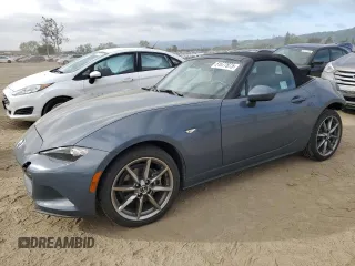 2021 Mazda MX-5 Miata Grand Touring with VIN JM1NDAD74M0458766, listed as a Copart auction lot 51677875 with 19,135 mi miles and Salvage title. Bid and sale history available at DreamBid. Image 1.
