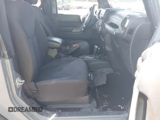 2015 Jeep Wrangler Freedom Edition with VIN 1C4AJWAG1FL714002, listed as a IAAI auction lot 42579024 with 98,732 mi miles and . Bid and sale history available at DreamBid. Image 5.
