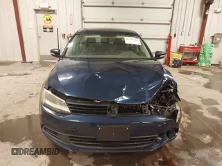 2012 Volkswagen Jetta Sedan TDI with VIN 3VW3L7AJ8CM378733, listed as a IAAI auction lot 41571197 with 151,159 mi miles. Bid and sale history available at carsss.com. Image 12.