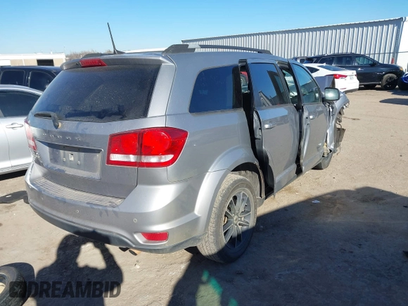 2019 Dodge Journey SE with VIN 3C4PDCBB6KT738488, listed as a IAAI auction lot 41330395 with Not Provided miles and . Bid and sale history available at DreamBid. Image 4.