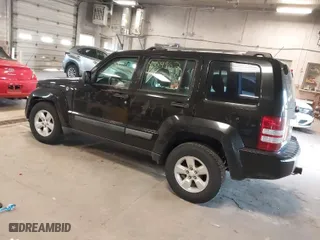 2009 Jeep Liberty Sport with VIN 1J8GN28K79W547903, listed as a IAAI auction lot 41889962 with 127,821 mi miles. Bid and sale history available at carsss.com. Image 3.