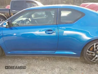 2014 Scion tC with VIN JTKJF5C72E3086001, listed as a IAAI auction lot 41721986 with 207,239 mi miles. Bid and sale history available at carsss.com. Image 14.