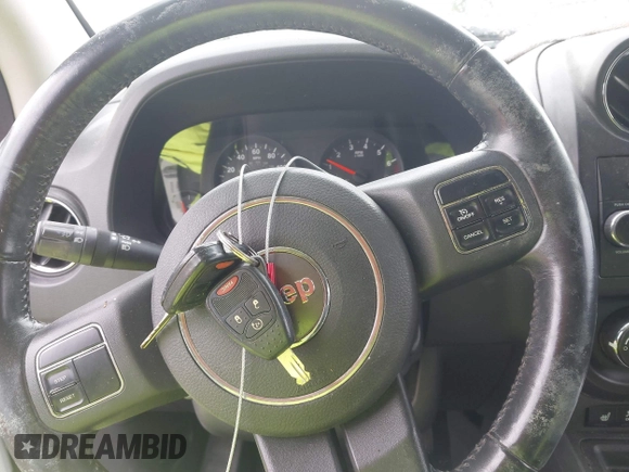 2011 Jeep Compass Latitude with VIN 1J4NT1FB1BD192076, listed as a IAAI auction lot 42121930 with 148,548 mi miles. Bid and sale history available at carsss.com. Image 11.