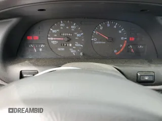 1999 Nissan Altima XE z VIN 1N4DL01D9XC148205, wystawiony jako Copart lot #50392305 z przebiegiem 90 698 mil mil oraz Szkoda całkowita • Salvage title. Historia ofert i sprzedaży dostępna na DreamBid. Obrazek 9.