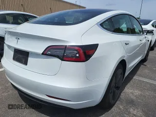 2020 Tesla Model 3 Long Range with VIN 5YJ3E1EB1LF637306, listed as a IAAI auction lot 42184417 with 46,797 mi miles and . Bid and sale history available at DreamBid. Image 1.