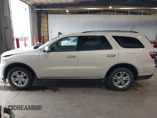2012 Dodge Durango SXT with VIN 1C4RDJAGXCC295138, listed as a IAAI auction lot 42333094 with 96,581 mi miles and . Bid and sale history available at DreamBid. Image 14.